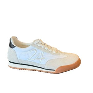 women's white sneaker with tone on tone stitching and black accents