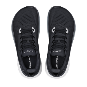 Black athletic shoes with white sole on a white background