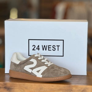 Brown sneakers with '24' logo on a wooden surface, brand '24 West' visible.