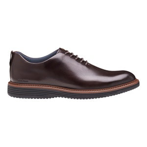 Brown leather shoe on a white background