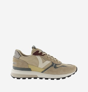 Beige sneaker with multicolor accents on a white background