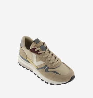 Beige sneaker with gray accents on a white background
