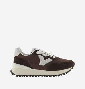 Brown and white sneaker on a white background