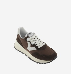 Brown and white sneaker on a white background
