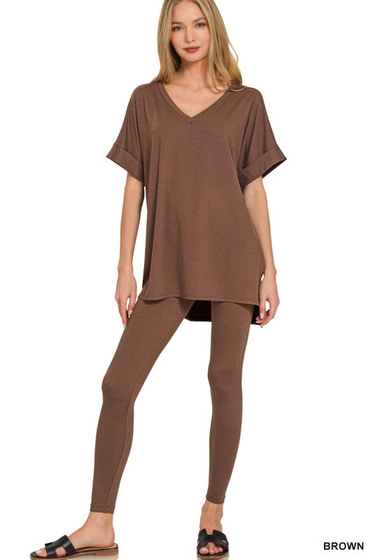 Woman wearing a brown outfit on a white background