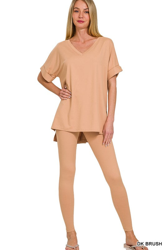 Woman wearing a beige outfit on a white background