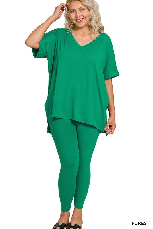 Woman wearing a green outfit on a white background