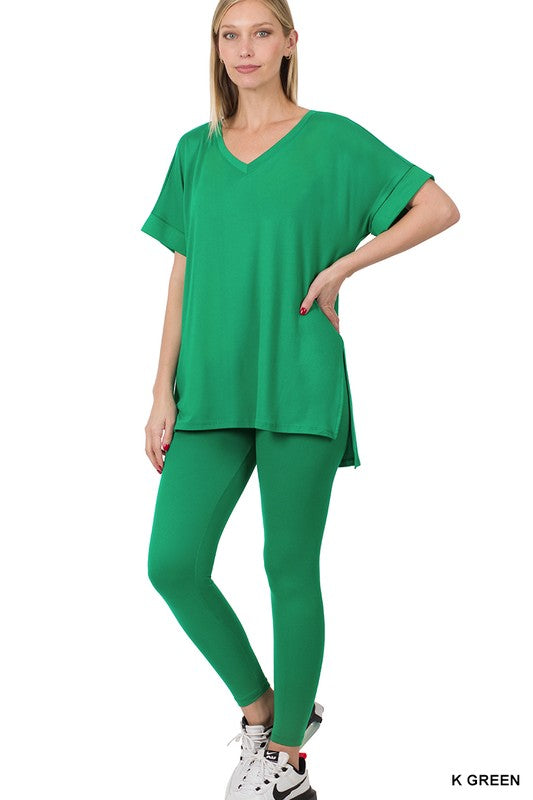 Woman wearing a green outfit on a white background