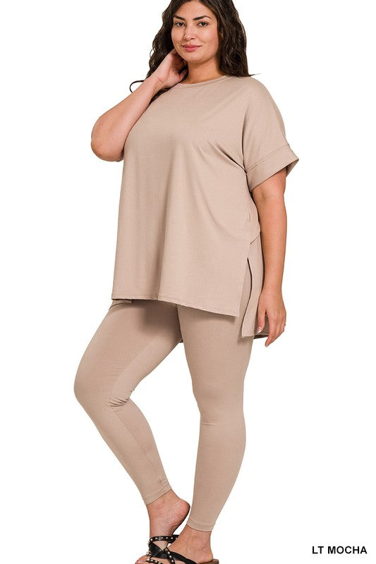 Woman wearing a light brown outfit on a white background