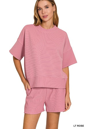 women's light rose pink shorts outfit