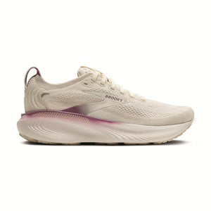 White running shoe with pink sole on a white background