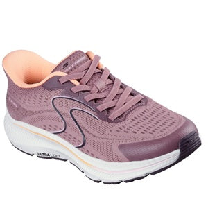 Pink running shoe with white sole on a white background