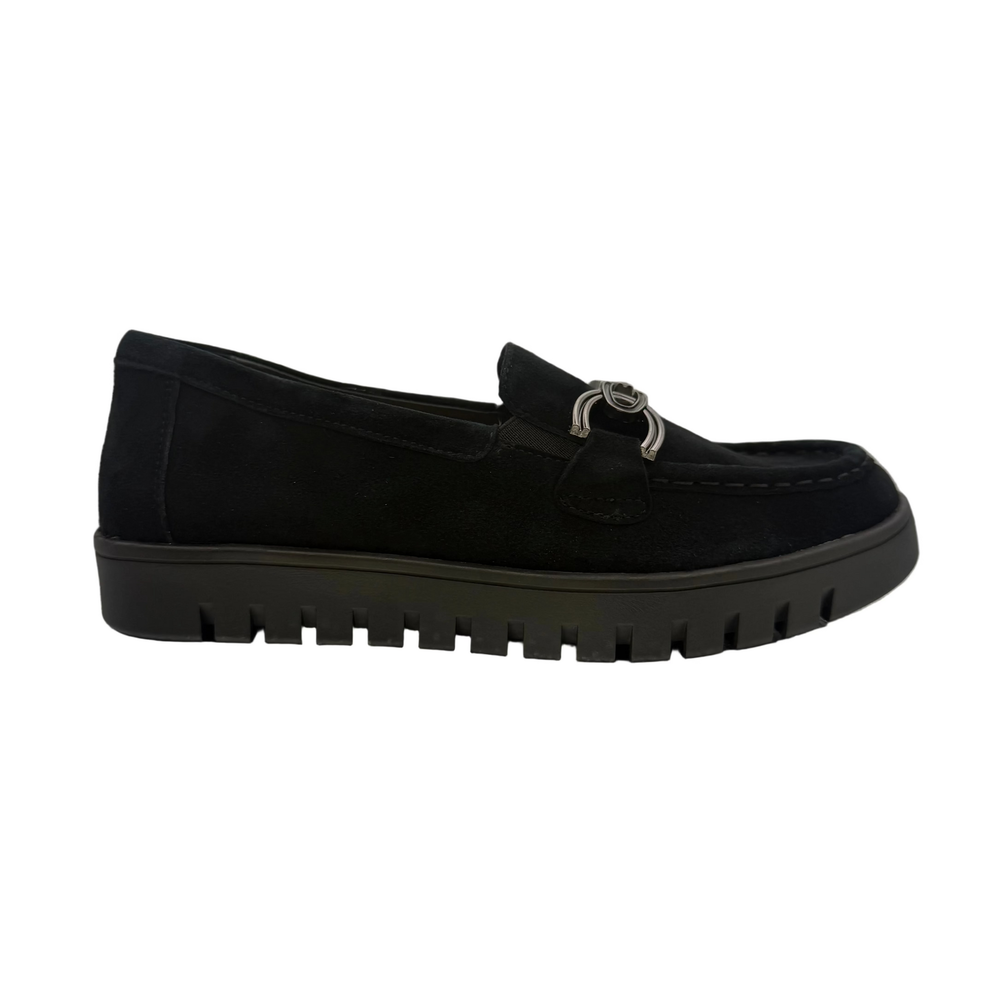 A black slip-on loafer-style shoe with a textured sole and a metallic ring detail on the vamp.