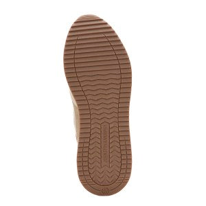 Close-up of a brown shoe sole on a white background