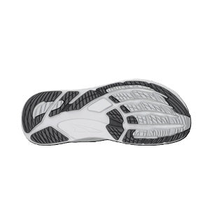 White athletic shoe with black sole on a white background