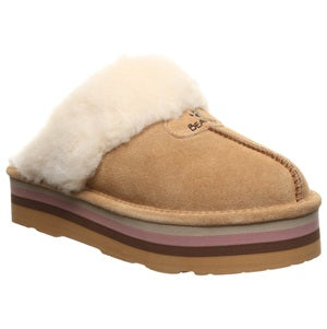 Tan slipper with white fur lining on a white background