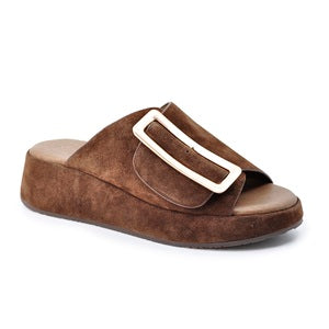 women's chocolate brown suede slide sandal with a wide strap featuring a large gold rectangular buckle