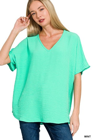 Zenana  Woven Airflow V-neck SS Top