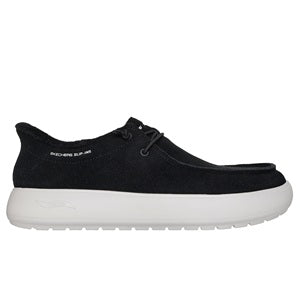 Black slip-on sneaker with white sole on a white background