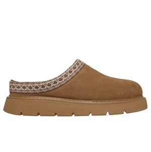 Brown slip-on shoe with a patterned strap on a white background