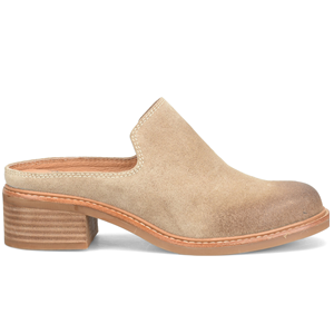 Beige suede clog shoe on a white background
