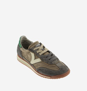 Brown and gray sneaker on a white background