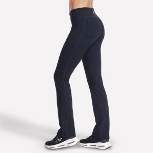 Person wearing black leggings on a white background