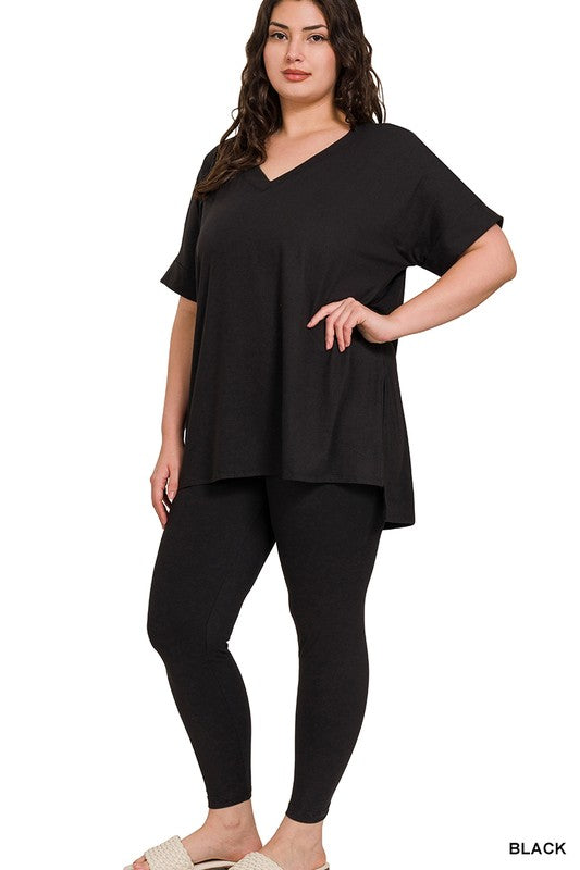 Woman wearing a black outfit on a white background