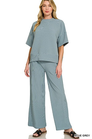 women's blue-grey outfit with wide-leg pants and a matching top